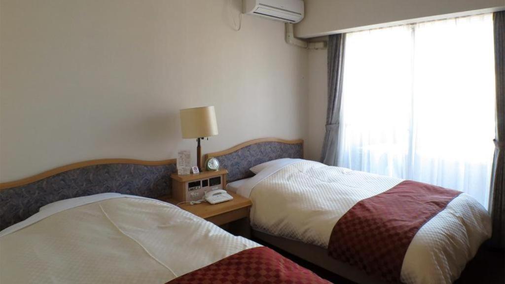 Hotel Tenchikaku Hitachi Extérieur photo